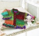 Babycardigan med fl&aelig;ser - i Noro Miniknits II